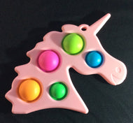 Pink Unicorn Simple Dimple Fidget Approximately 6 inches wide and 6 inches high
