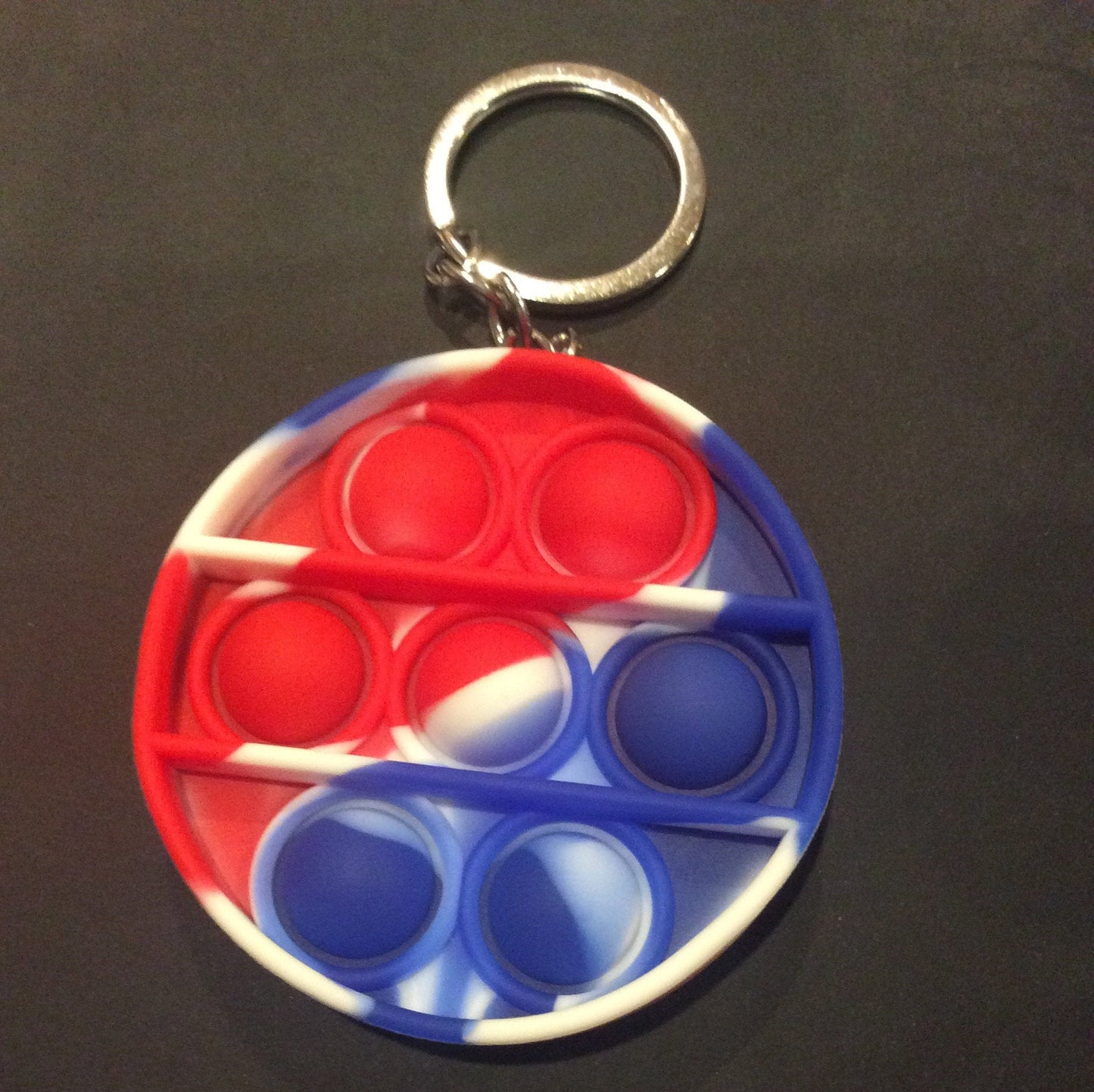 Circle Red, White and Blue Bubble Pop It Fidget Keychain Approximately 2.5 inches tall