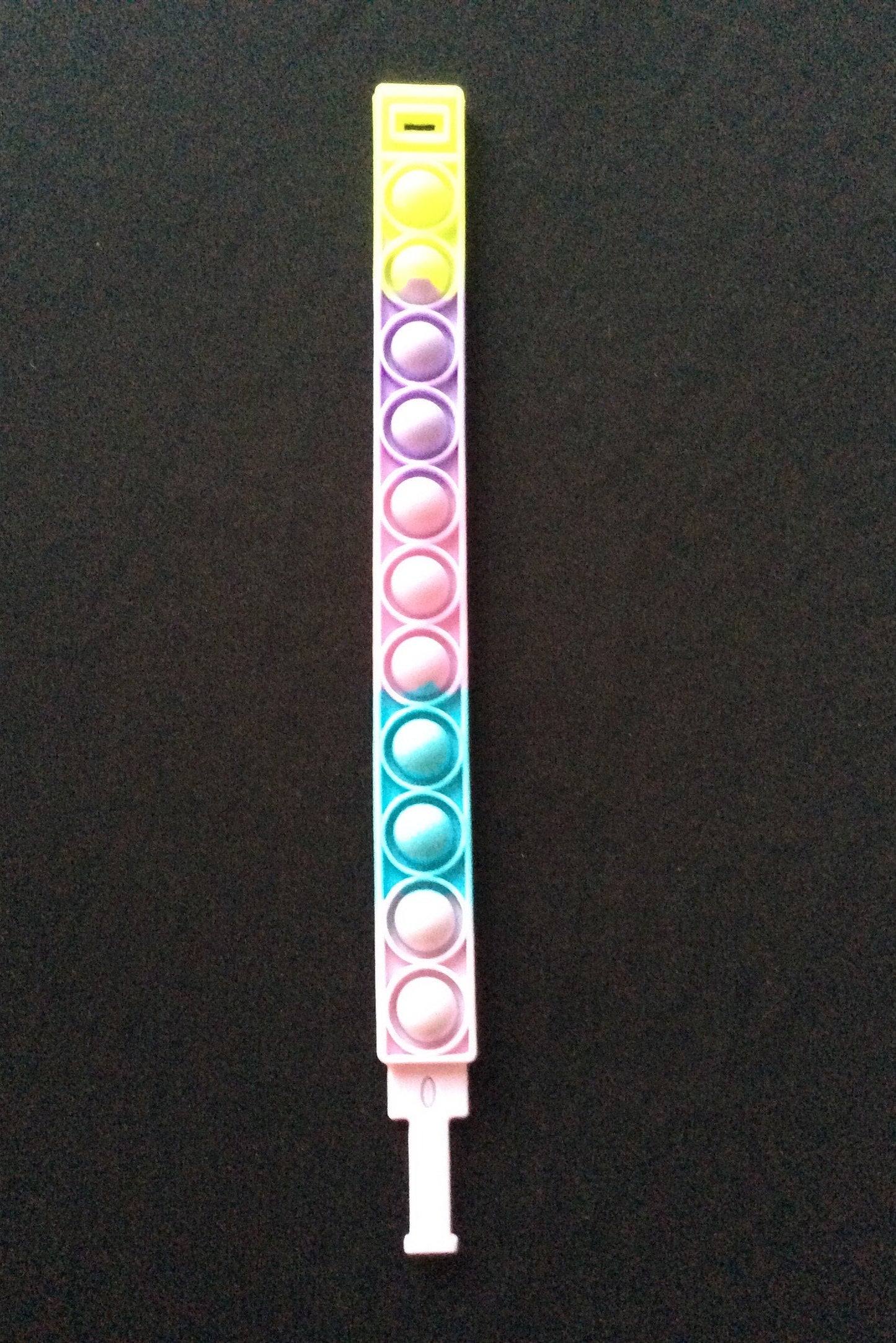 Multicolored Bracelet Bubble Pop It Fidget 7.75 inches long.  Yellow, Lavender, Pink and Blue